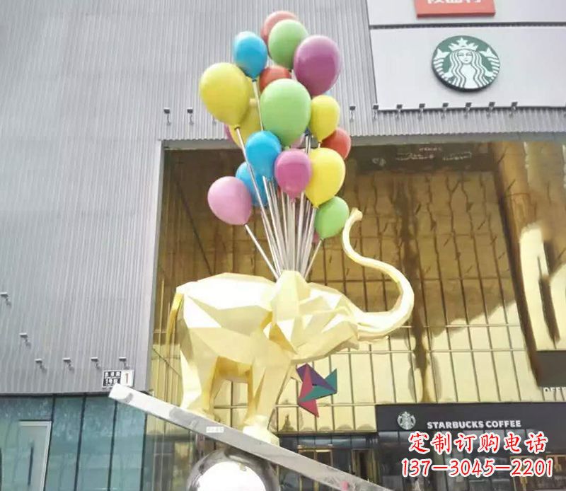 长春不锈钢踩球的小象雕塑