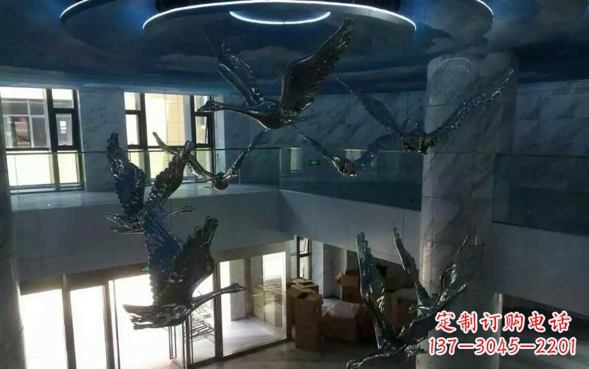 长春不锈钢天鹅雕塑赋予室内空间灵动之美