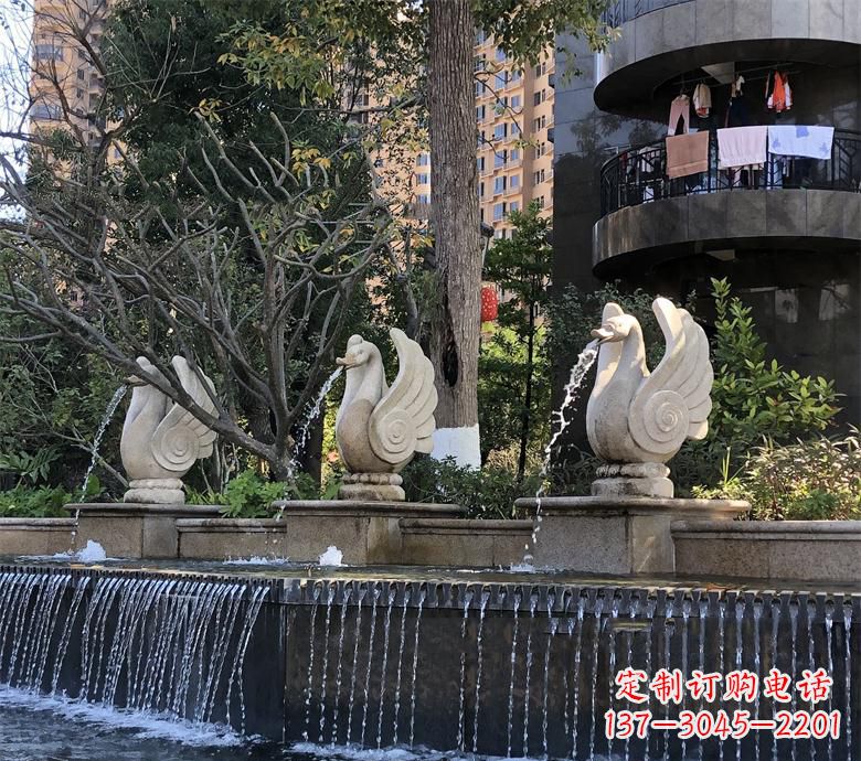长春石材喷水鹅 园林动物石雕景观摆放 水池石天鹅