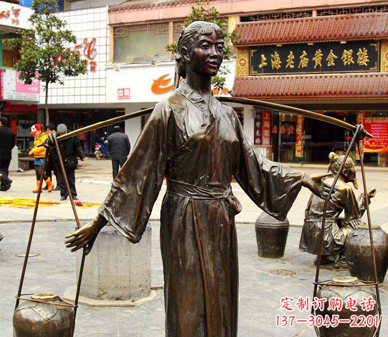 长春挑着罐子的古代女人铜雕