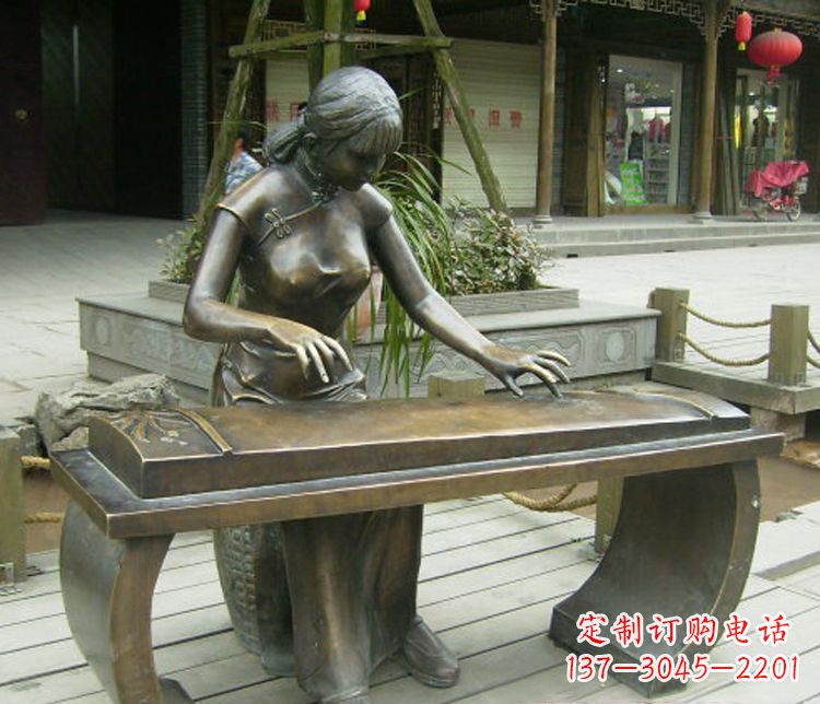 长春铜雕现代人物弹古筝雕塑