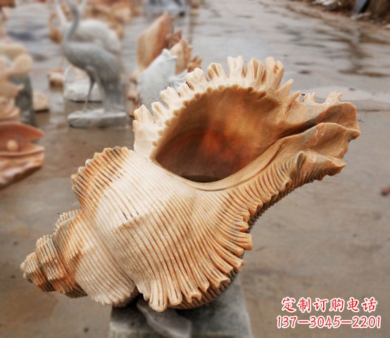 长春晚霞红海螺石雕广场景观雕塑